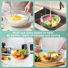 Glass mixing bowls set with whisk mixing ingredients for prep