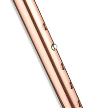 Bronze cane shaft close-up with grip holes and small metal ring