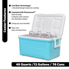 Hard-sided ice chest cooler with open lid, aqua blue body and white interior