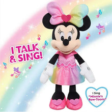 Minnie Mouse plush singing doll with rainbow bow, pink ruffled dress, and white gloves