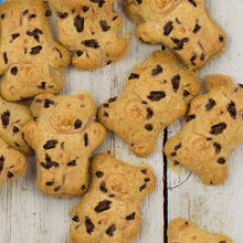 Chocolate chip teddy graham cookies with dark chocolate spots on light background