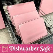 Pink nonstick baking sheet set in oven rack, dishwasher-safe style cookie pans