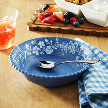 Blue floral melamine dinner bowl with scalloped rim and daisy pattern