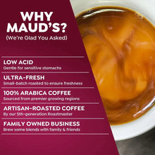 Brewed coffee in a cup next to a Maud's quality info panel