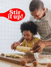 Dough preparation for baking on a countertop with a person and child assisting