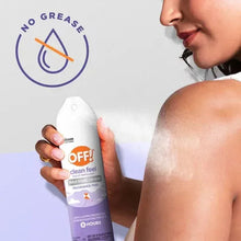 OFF! clean feel aerosol can in hand, mist spraying toward bare skin