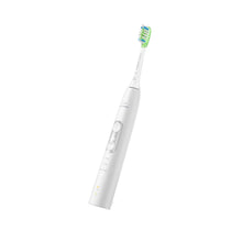 White Philips Sonicare 6100 ProtectiveClean power toothbrush with green bristles