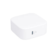 White USB-C laptop charger brick with compact cube shape and small logo