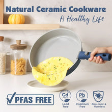 Navy ceramic skillet with detachable handle, shown holding an omelet on a plate.