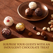 Ferrero chocolate assortment on a plate with wrapped candies and assorted truffles