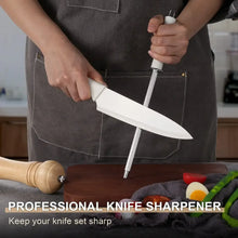 Knife sharpener tool with a white chef knife held at a sharpening angle on a board