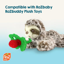 RaZberry silicone teether toy attached to plush, green handle with red textured berry.
