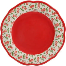 Dinner plate with red solid center, cream floral ring, and red scalloped edge
