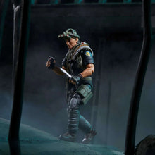 G.I. Joe Tunnel Rat action figure walking holding a pistol and rifle