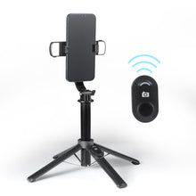 Black selfie stick tripod with phone clamp plus wireless remote for selfie control