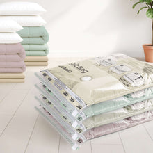 Clear jumbo vacuum storage bags with folded bedding layers