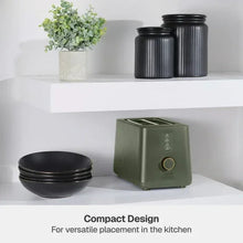 Dusty moss compact 2-slice toaster with round shade dial on the front