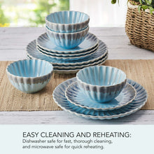 Blue stoneware bowls and scalloped plates arranged on a tabletop