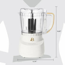 Drew Barrymore 3-cup food chopper, clear top and bowl with black blade, white base