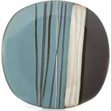 Teal dinner plate with vertical stripe glaze in cream and dark lines
