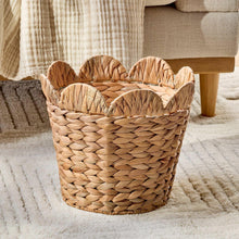 Water hyacinth basket with scalloped rim, woven tan, empty interior
