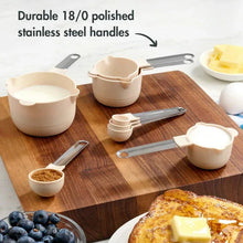 Light gray measuring cups and spoons set with stainless steel handles