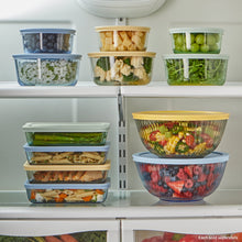 Set of blue tinted round storage containers with clear plastic lids, various sizes