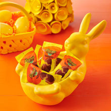 Easter basket filled with Reese’s peanut butter eggs snack-size wrapped candies