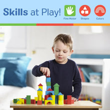Colorful wooden blocks for fine motor and shape play, displayed on a table.