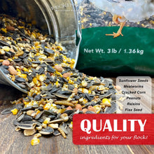 Cracked corn, sunflower seeds, and mealworms pouring from a green-lined bag