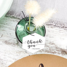 White cardstock thank-you tag tied with twine, with 'The Smiths' on the label