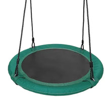 Green saucer swing with black hanging ropes and round dark mesh base
