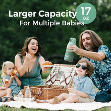 Green portable milk warmer device held with baby feeding bottle and warmer parts