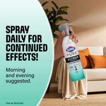 Clorox PURE daily air spray bottle held in hand with gray trigger