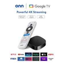 Black streaming media box with white remote angled to the front