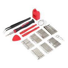 Precision repair toolkit pieces: red-handled drivers, metal bits, pry tool, tweezers, pick