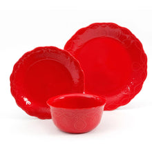 Red dinnerware bowls and plates set, glossy with lace embossing and scalloped rims