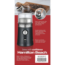 Electric coffee grinder with clear hopper and black housing, product overview view