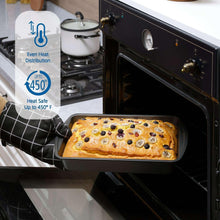 Non-stick loaf pan with baked bread inside oven, showing even heat distribution