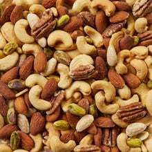 Mixed nuts close-up with cashews, almonds, pecans, and pistachios