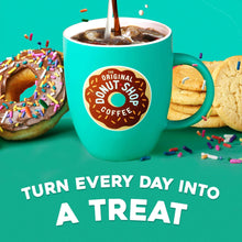 Dark roast coffee cup with steaming pour and donut shop pod label