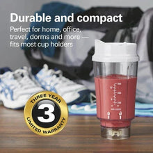 Personal blender travel jar with red smoothie and visible blending blade assembly