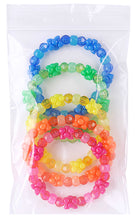 Clear reclosable bag holding three colorful bead bracelets, white zip seal at top