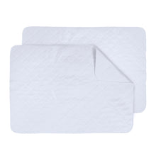 Set of two white fleece multi-use pads with quilted diamond texture