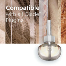 Glade PlugIns glass warmer with silver base and white nozzle