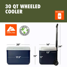 Hard-sided wheeled cooler with telescoping handle and wheels, white lid, navy body