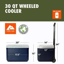 Hard-sided wheeled cooler with dark navy body, white lid, and front wheels