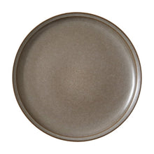 Brown stoneware dinner plate top view, speckled glaze finish