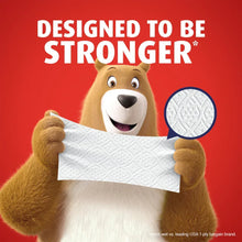 Charmin Ultra Strong toilet paper sheet held by bear mascot, textured sheet shown