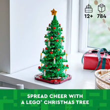 LEGO Christmas tree toy with green brick-built tree on red base and yellow star